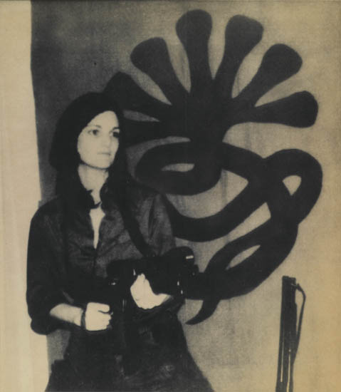 Appraisal: CRIME Patricia Hearst in front of Symbionese Liberation Army Poster