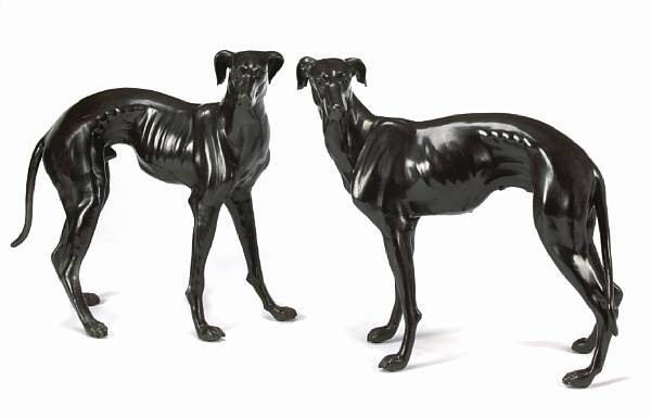 Appraisal: A pair of bronze figures of standing hounds height in