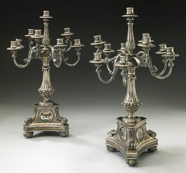 Appraisal: A pair of Louis XVI style silvered bronze candelabra late