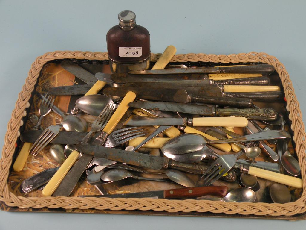 Appraisal: A large quantity of plated cutlery and a hip flask