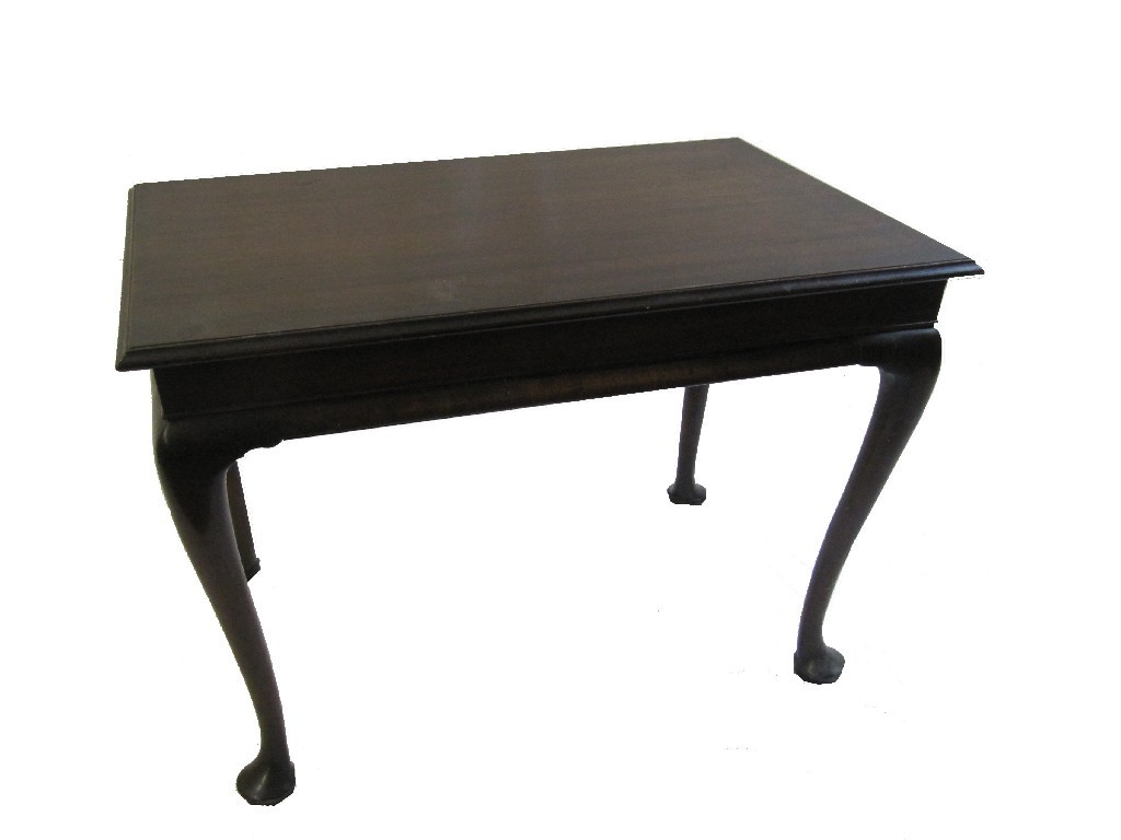 Appraisal: A Georgian mahogany silver table raised on cabriole supports cm