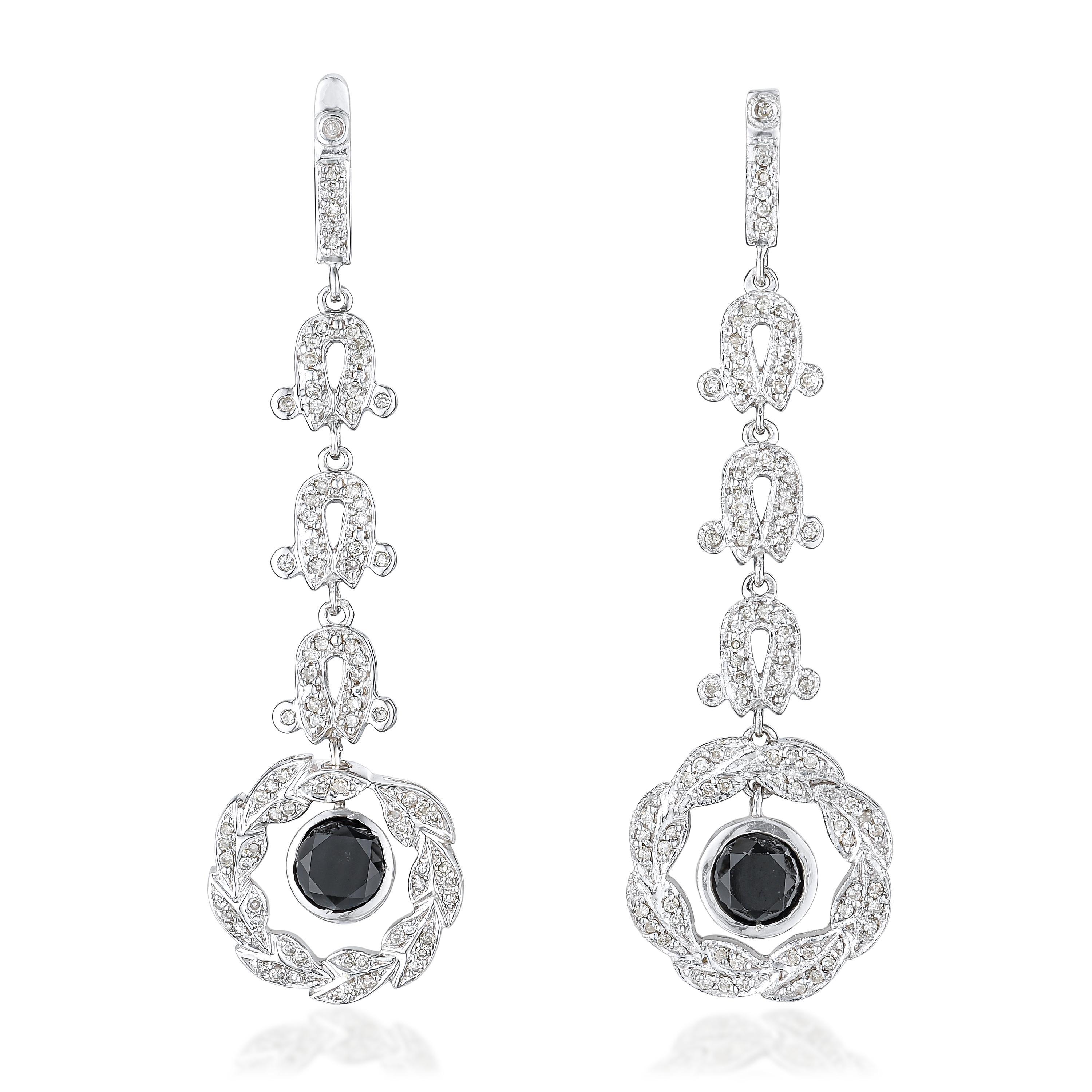 Appraisal: BLACK DIAMOND AND DIAMOND DROP EARRINGS METAL K white gold