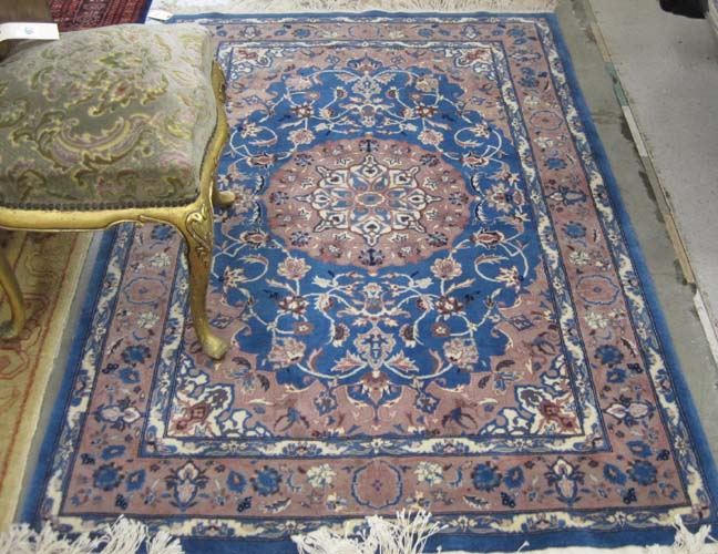 Appraisal: HAND KNOTTED ORIENTAL AREA RUG Sino-Persian floral and central floral