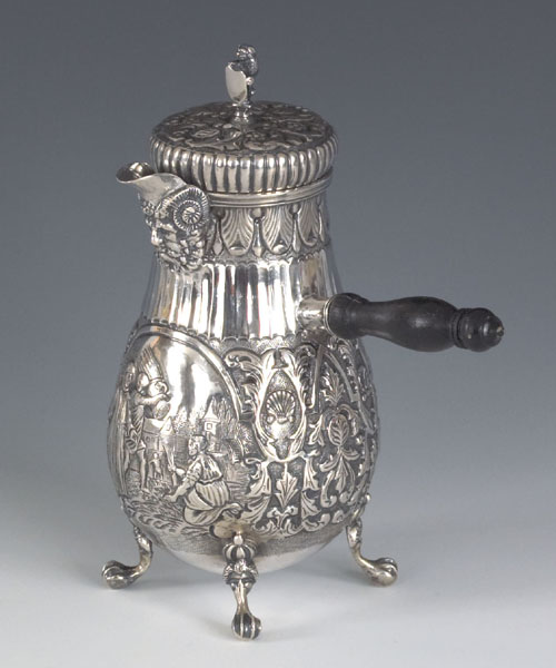 Appraisal: Continental silver chocolate pot ca with overall repousse decoration and