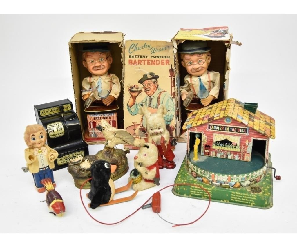 Appraisal: Two Charlie Weaver Bartenders in original boxes h tin Farmer