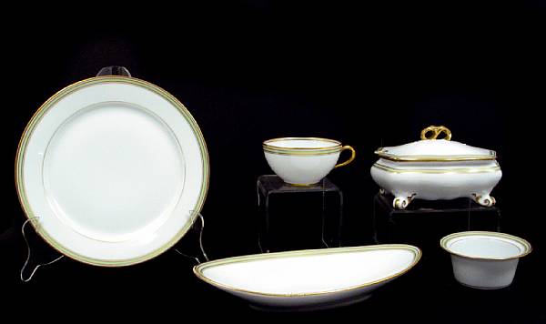 Appraisal: A Limoges porcelain part dinner service in the 'Old Abbey'