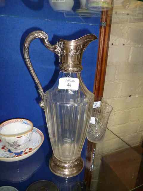 Appraisal: A CONTINENTAL CUT GLASS AND SILVER MOUNTED CLARET JUG the