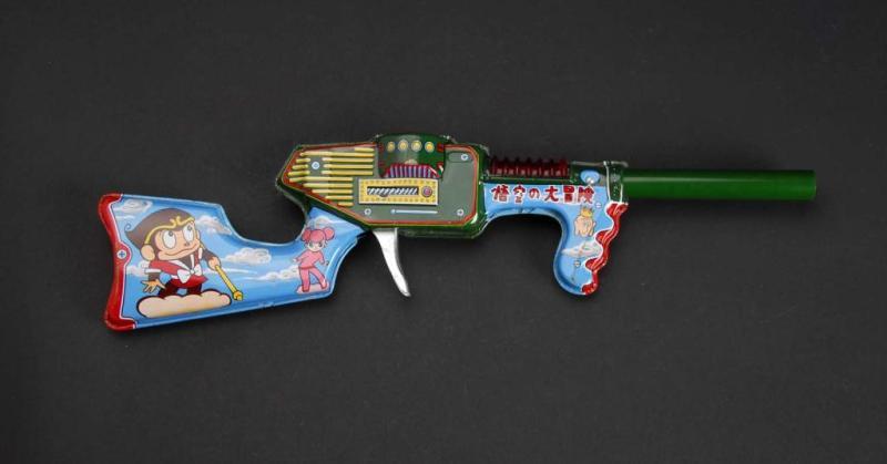 Appraisal: Koku Space Rifle Toy Description Japanese Made by Tada Working