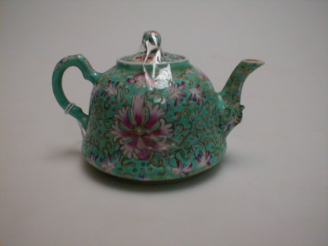 Appraisal: A thC Cantonese miniature teapot and cover turquoise ground with