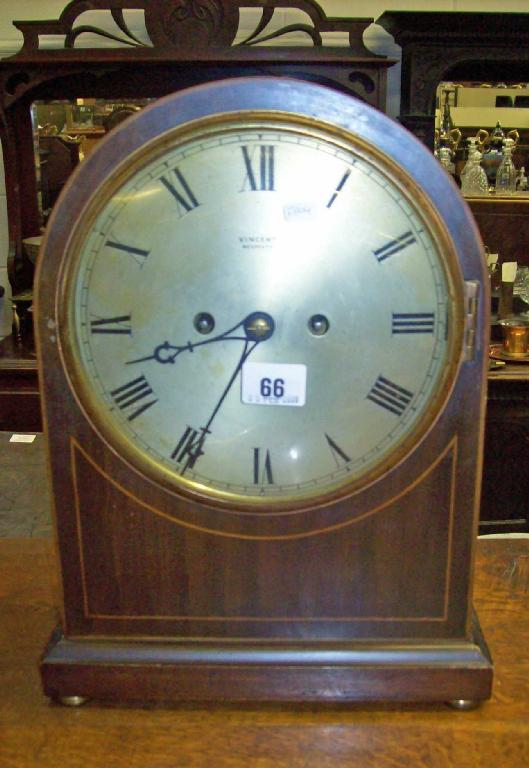 Appraisal: An Edwardian mahogany cased mantel clock with silvered dial inscribed