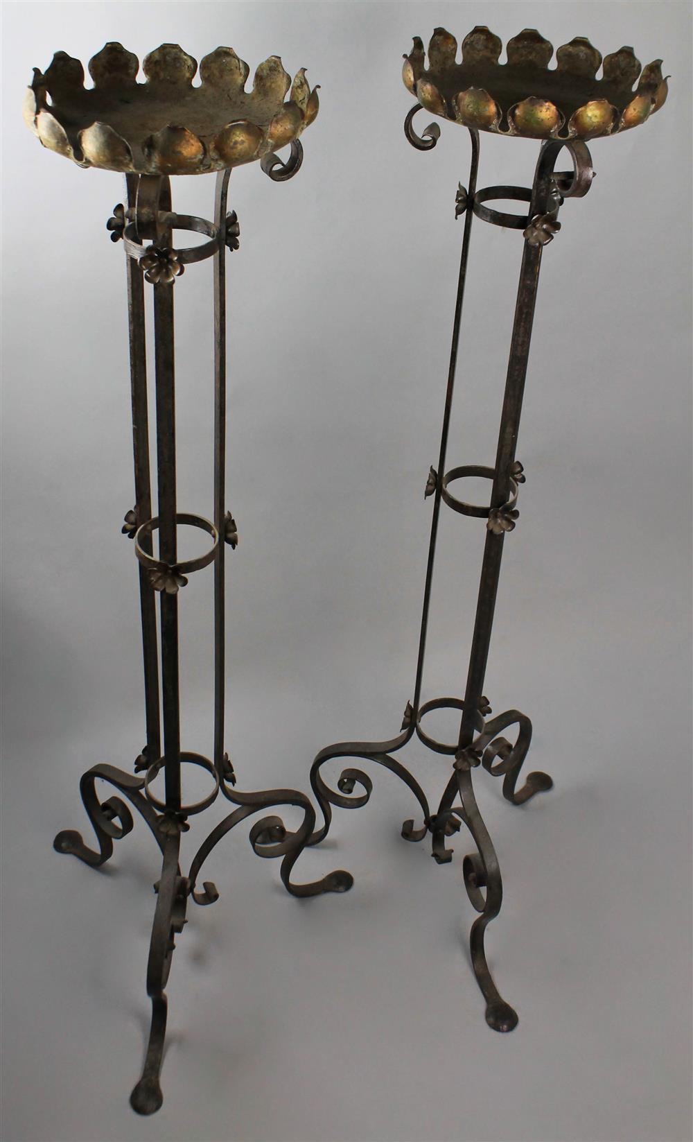 Appraisal: PAIR OF RENAISSANCE REVIVAL BRASS AND WROUGHT IRON CANDLE PLANT