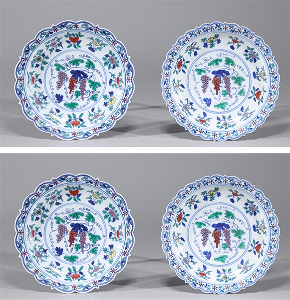 Appraisal: Four Chinese doucai porcelain dishes with flowers and grapes to