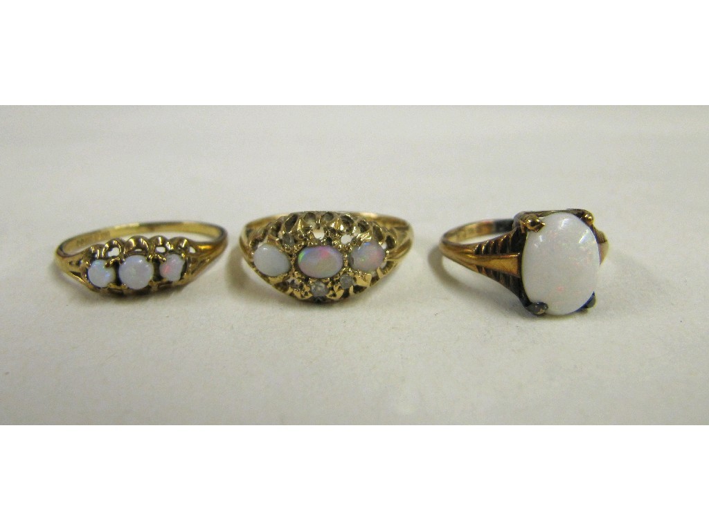 Appraisal: Lot comprising ct gold opal and diamond set ring stones