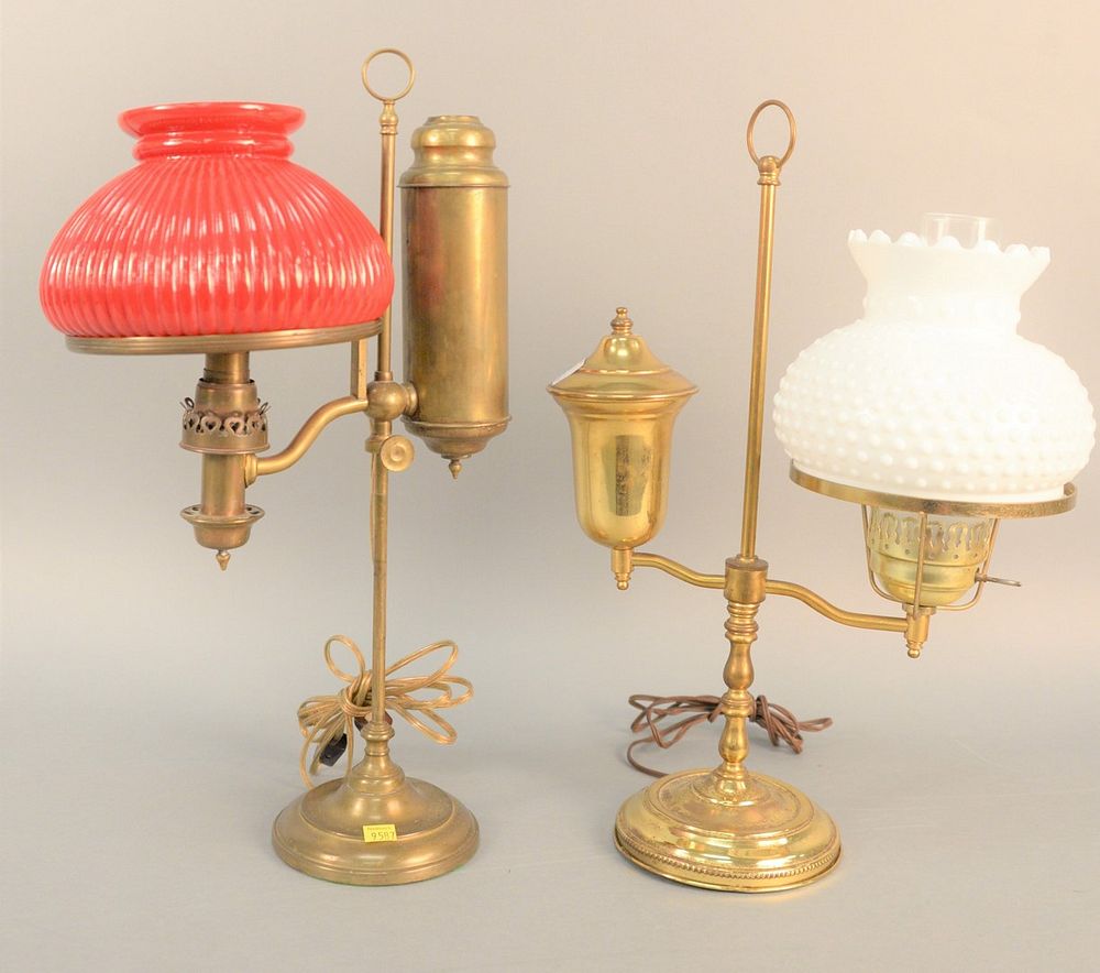 Appraisal: Two brass student lamps hts and Two brass student lamps