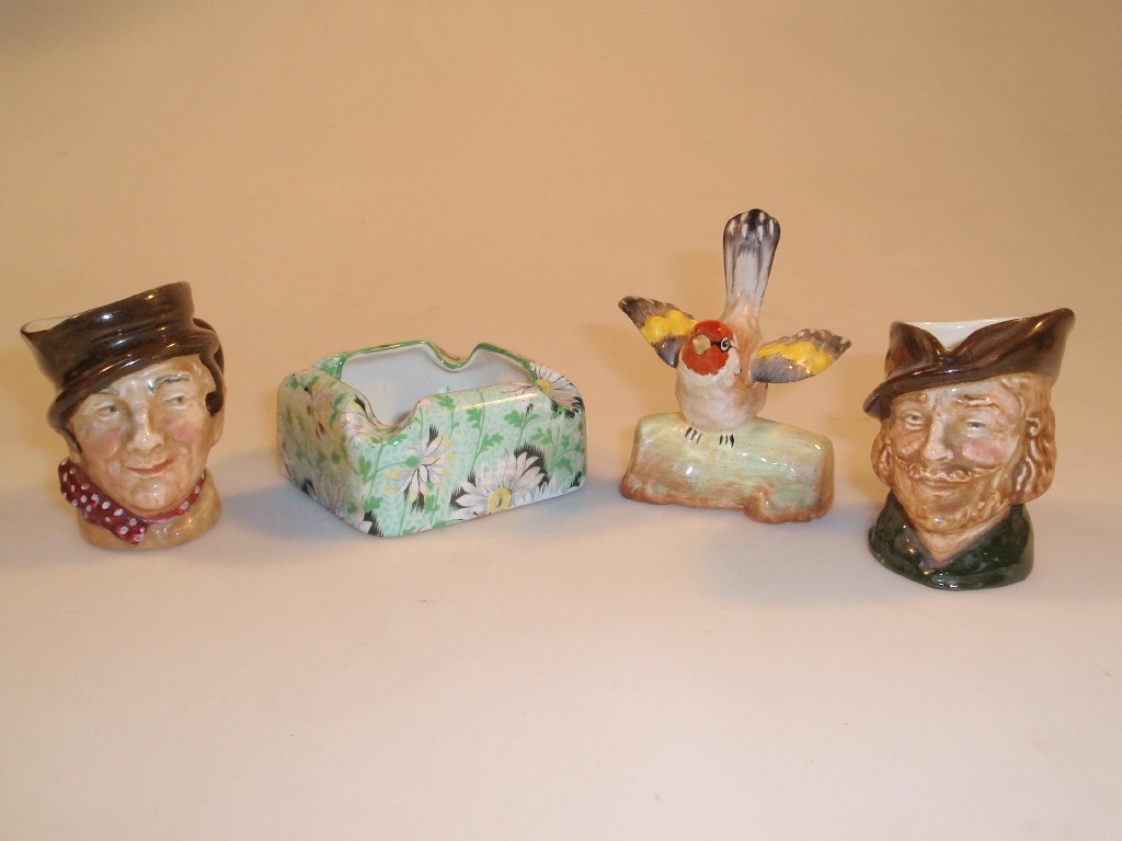 Appraisal: A Shelley chintz ashtray Crown Staffordshire goldfinch and two Royal