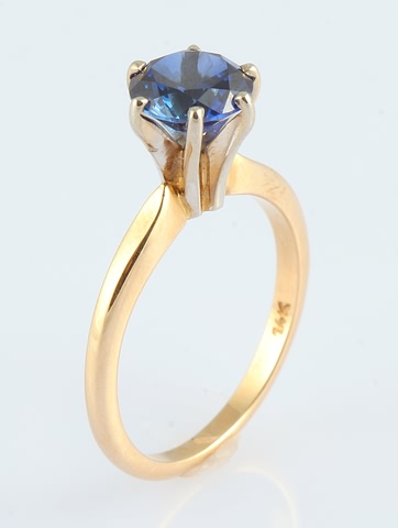 Appraisal: KY -prong setting with mm round blue sapphire Approx ct