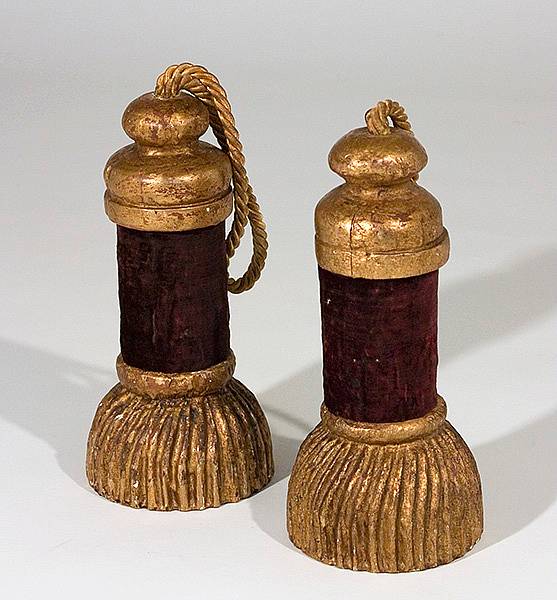 Appraisal: A pair of carved giltwood and velvet tassels and a