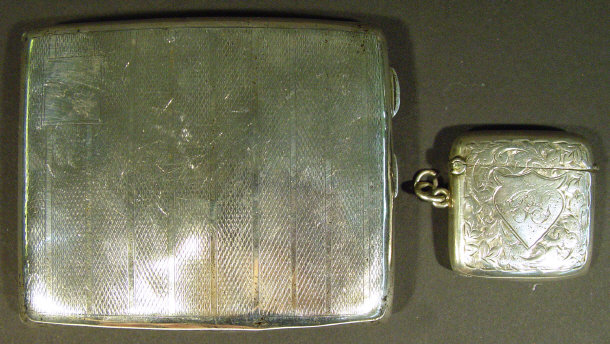 Appraisal: Edwardian silver Vesta case chased with leaves and a silver