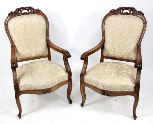 Appraisal: A pair of Victorian walnut armchairs to match lot