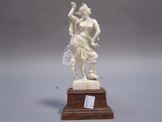 Appraisal: INDIAN CARVED IVORY FIGURE OF A DANCING TEMPLE WOMAN On