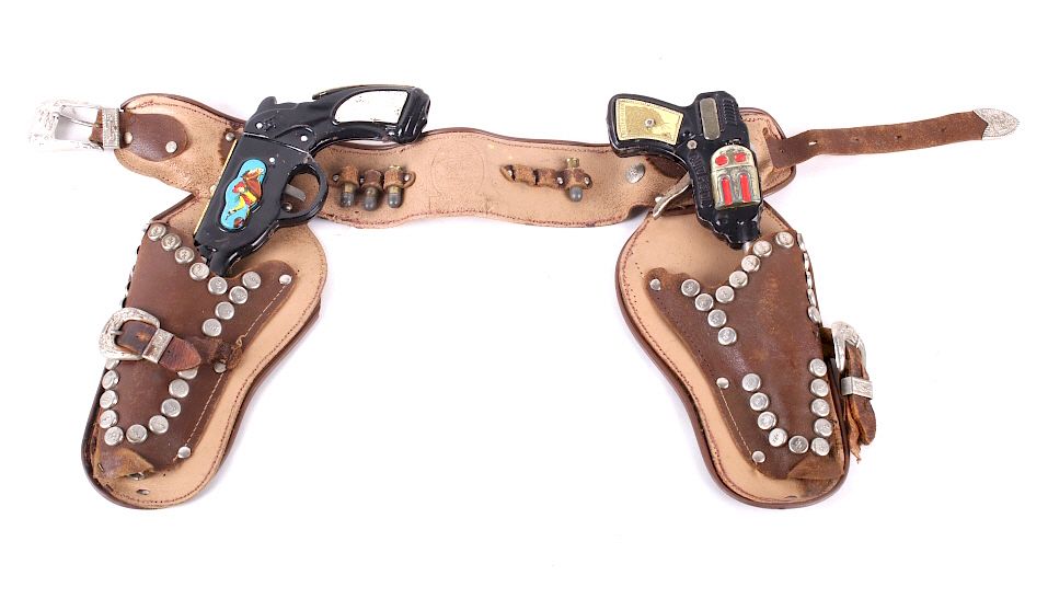 Appraisal: Vintage Roy Rogers Double Holster Toy Pistols Featured in this