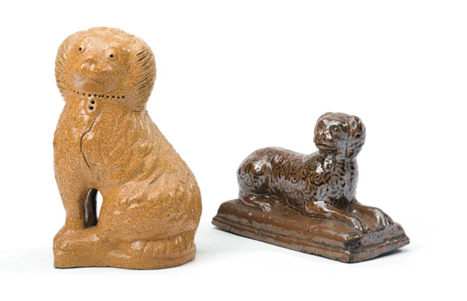 Appraisal: GLAZED STONEWARE FIGURE OF A SEATED SPANIEL POSSIBLY MID-WESTERN AND