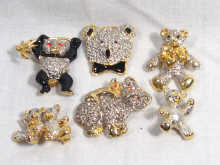 Appraisal: A mixed lot comprising six costume jewellery brooches