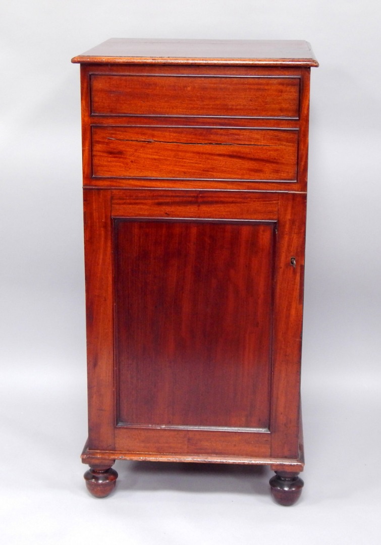 Appraisal: A thC mahogany pedestal cabinet with cock beaded panels to