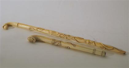 Appraisal: Two Chinese export elephant ivory pipesLong slender form carved to