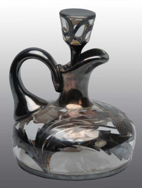 Appraisal: Heavy Silver Overlay Cruet Description Thistle design with lid No