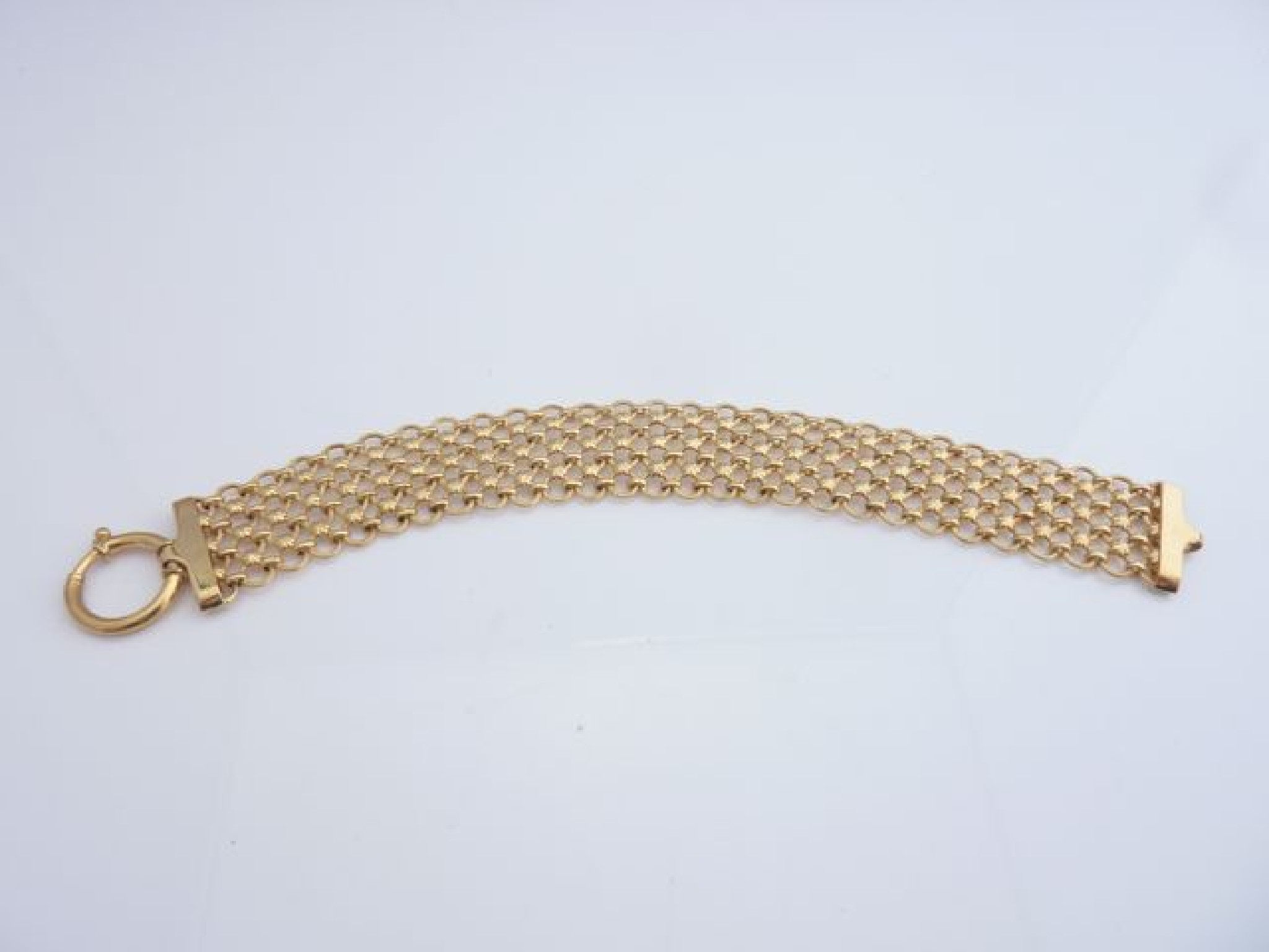 Appraisal: A ct gold mesh bracelet composed of textured circular links