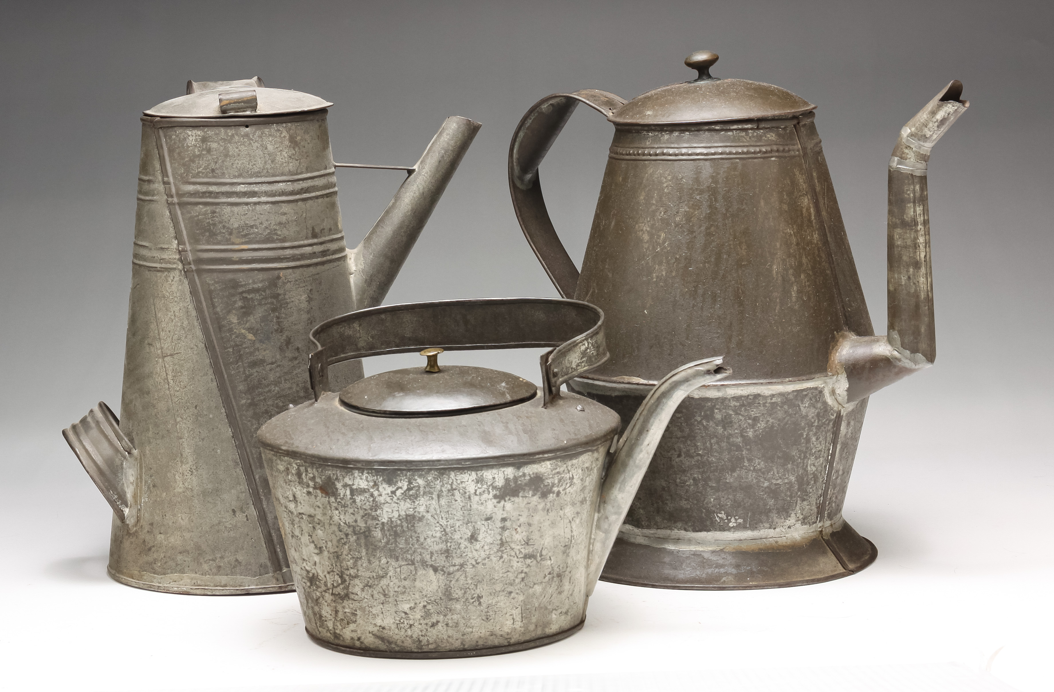 Appraisal: THREE AMERICAN TIN POTS Second half th century Including two