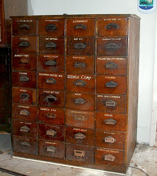 Appraisal: Drug Store Cabinet Ca - A -drawer oak cabinet with