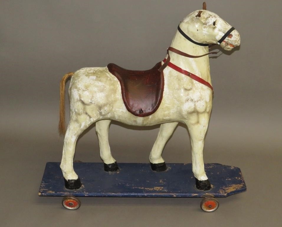 Appraisal: HORSE PULL TOYca in plaster with hand painted surface on