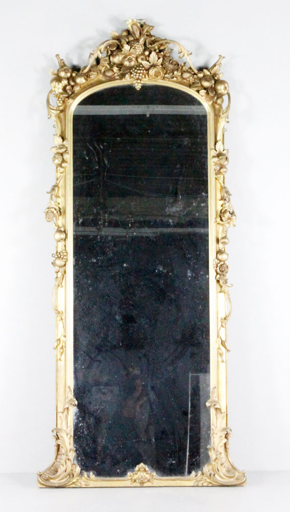 Appraisal: - French Gilded Mirror French gilded mirror heavily decorated with