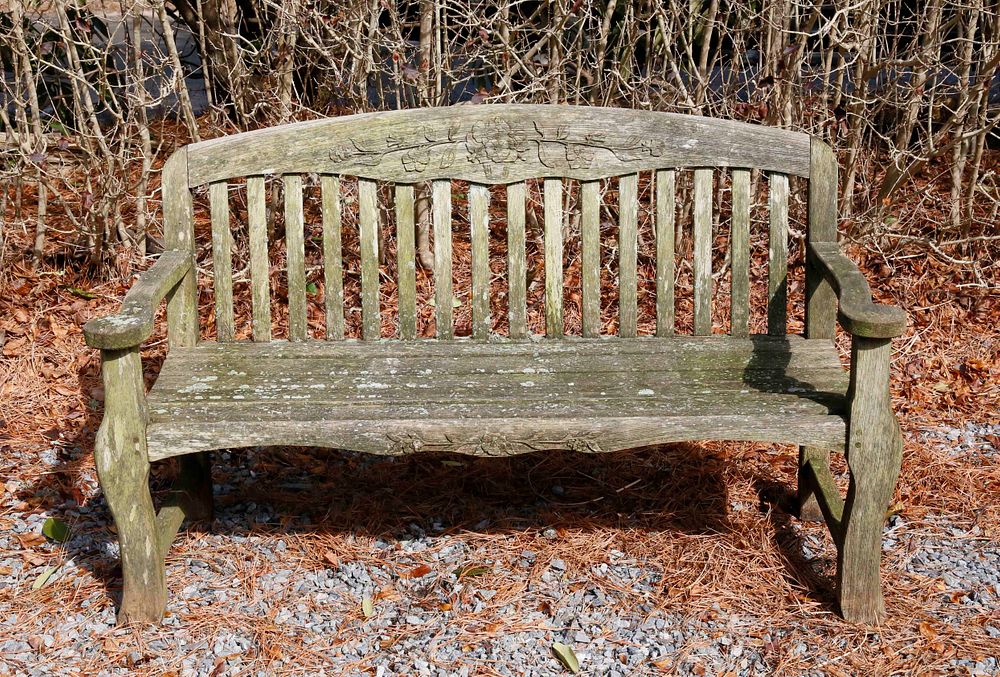 Appraisal: Kingsley-Bate Teakwood Bench Kingsley-Bate Teakwood Bench with floral carvings on