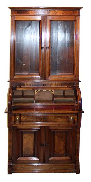 Appraisal: An American Victorian walnut cylinder bureau bookcase height in width