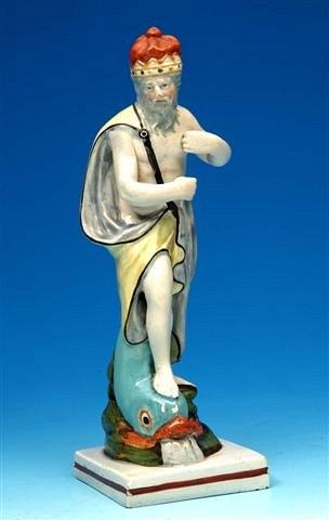 Appraisal: A th Century pearlware figure 'Neptune' polychrome decorated Trident deficient