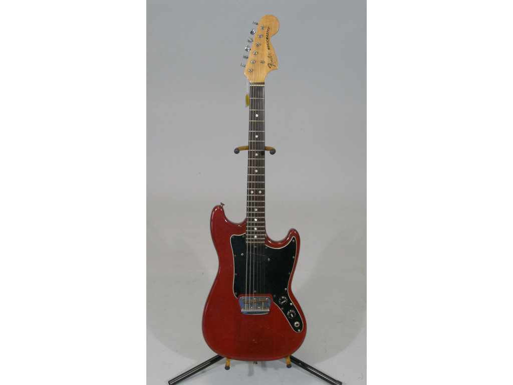 Appraisal: Vintage Fender Musicmaster Electric Guitar serial S red finish student