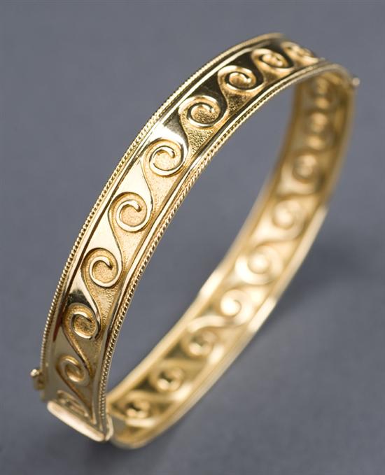 Appraisal: KT yellow gold flat bangle bracelet Bracelet is mm wide