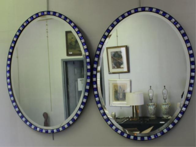 Appraisal: Pair of Oval Beveled Decorative Mirrors Good looking mirrors age