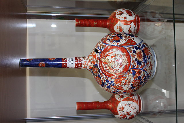 Appraisal: A JAPANESE BOTTLE VASE decorated in Imari colours with floral