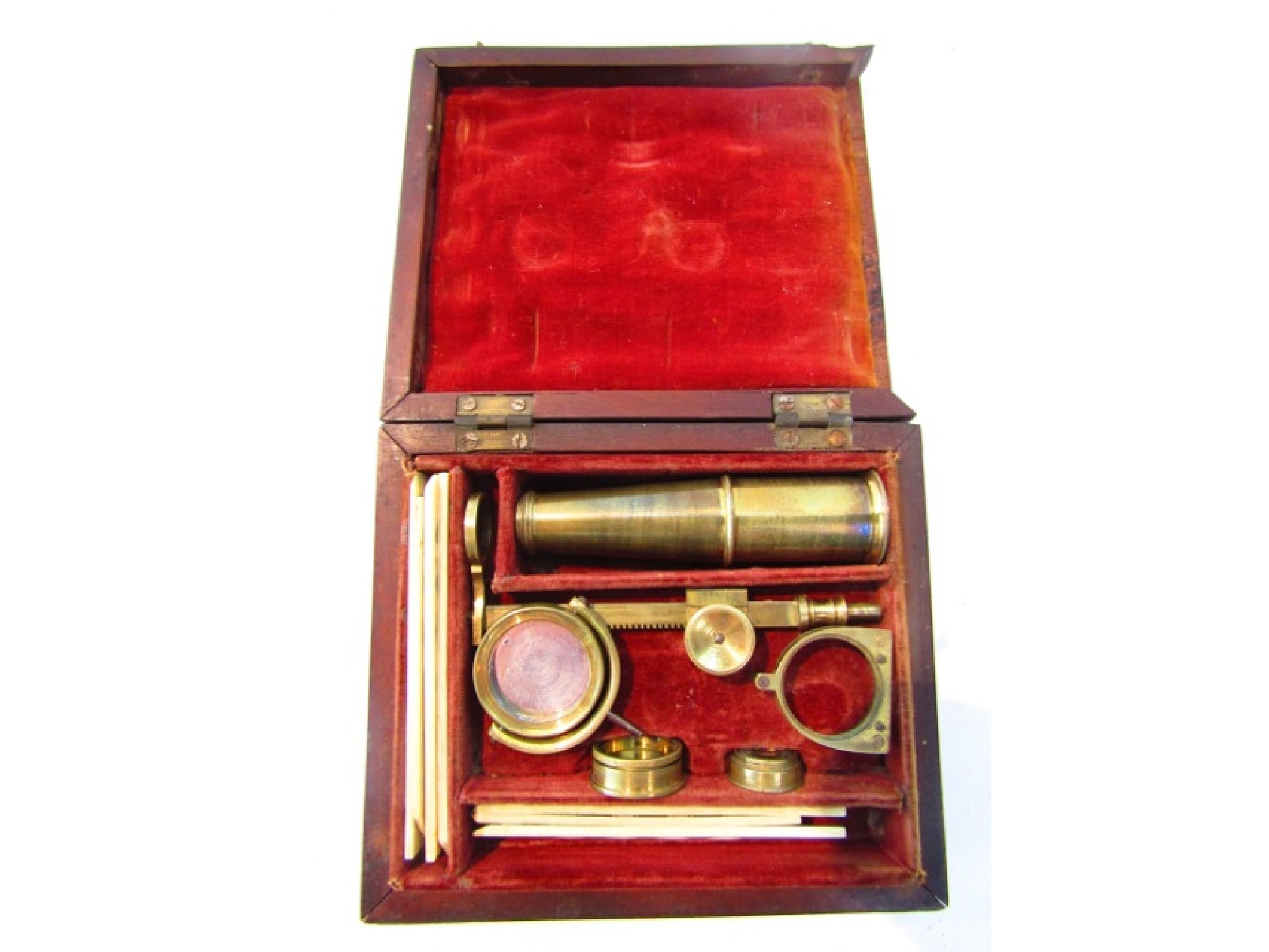 Appraisal: A miniature th century cased miniature travelling microscope deconstructed together