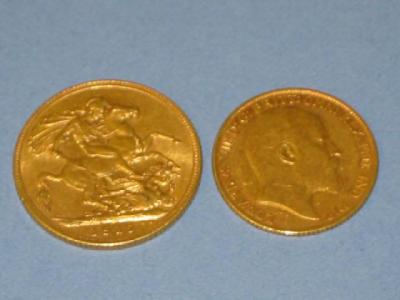 Appraisal: A GOLD SOVEREIGN dated and a half sovereign dated