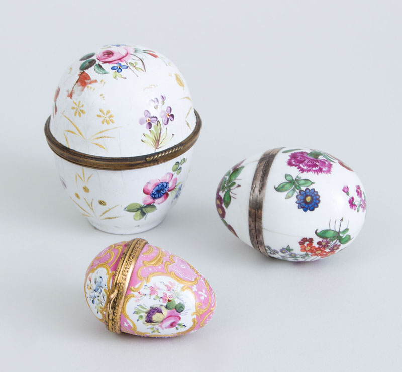 Appraisal: TWO SOUTH STAFFORDSHIRE ENAMEL EGG-FORM BOXES AND A PORCELAIN EGG-FORM