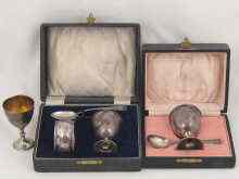 Appraisal: A silver boxed egg cup and spoon hallmarked Birmingham together