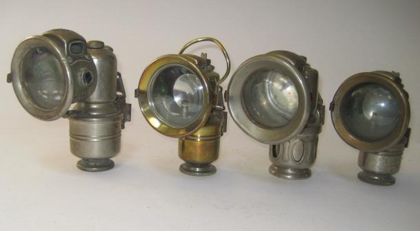 Appraisal: Four Powell Hamner carbide lamps a New a A Panther