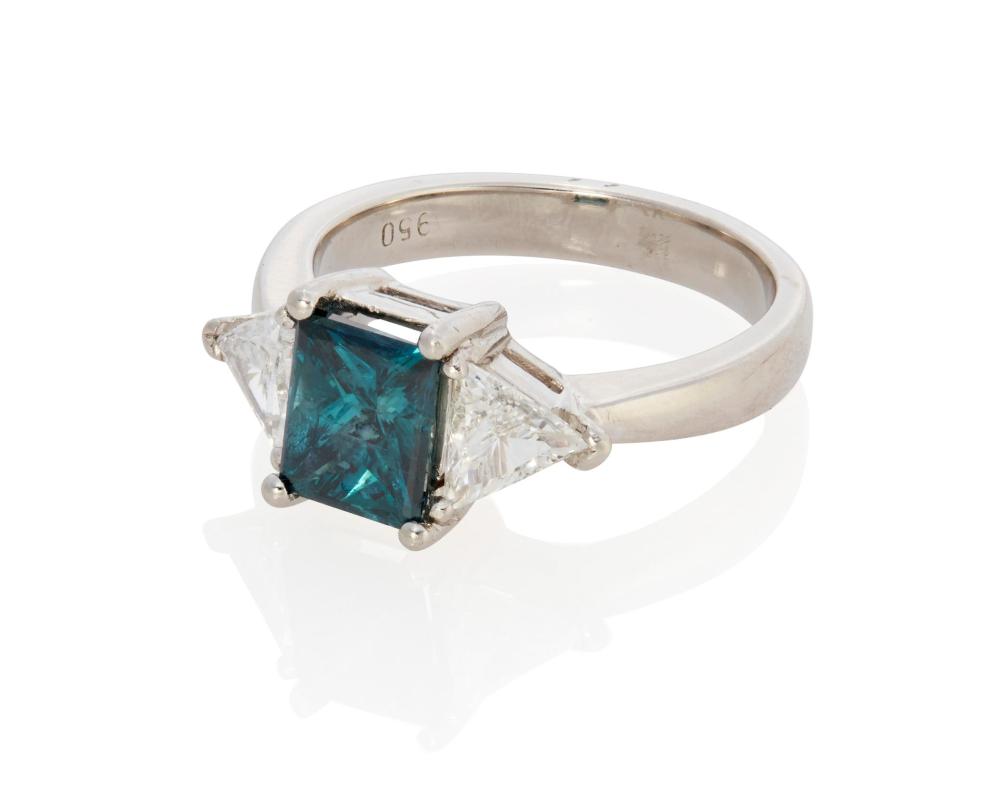 Appraisal: AN IRRADIATED BLUE DIAMOND RINGAn irradiated blue diamond ring Platinum