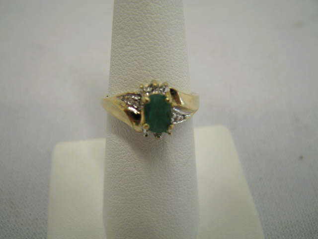 Appraisal: Emerald Diamond Ring oval gem and two small diamonds in