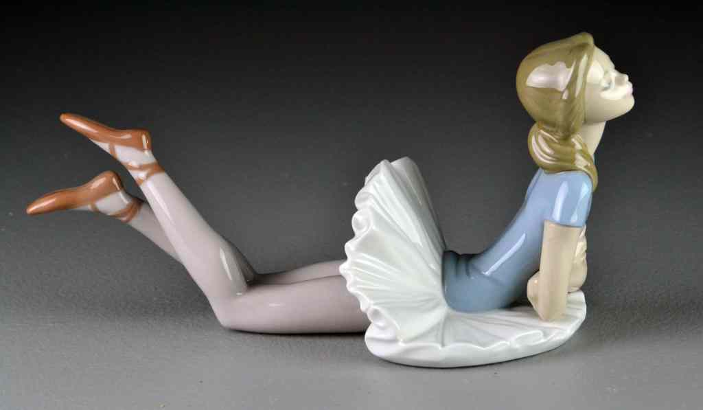 Appraisal: Lladro Porcelain Figurine ''Blue Ballerina'' depicting a ballerina laying on